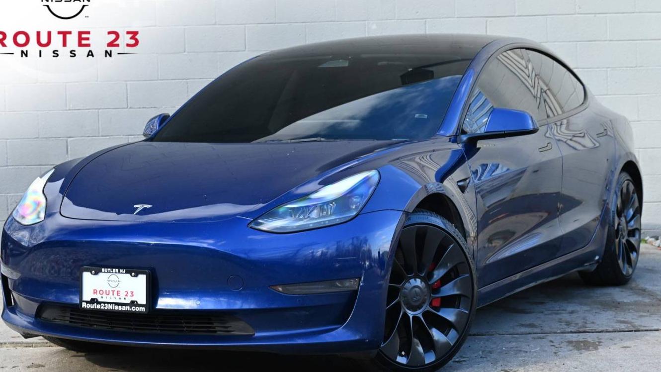 TESLA MODEL 3 2022 5YJ3E1EC2NF273747 image